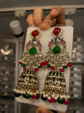 Lotus-motif kundan jhumka with red and green enamel detailing