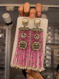 Pearl-strand bridal earrings with pink detailing