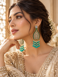 Lifestyle photo: teal and pearl bridal earrings