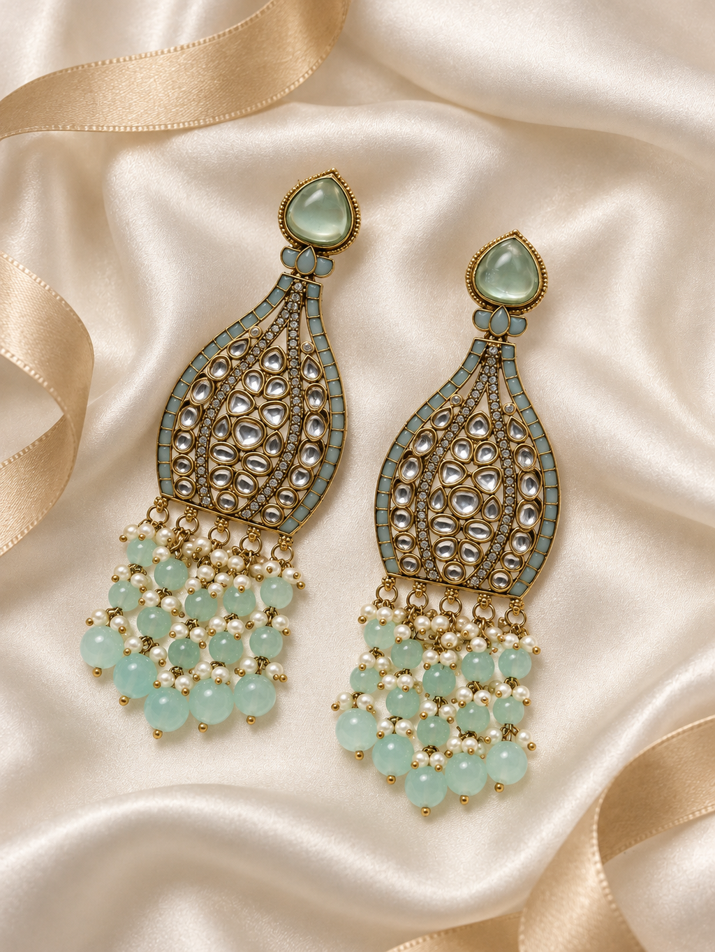 Editorial product-content photo: seafoam and pearl bridal earrings